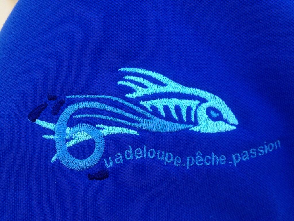 Polo brodée pêche